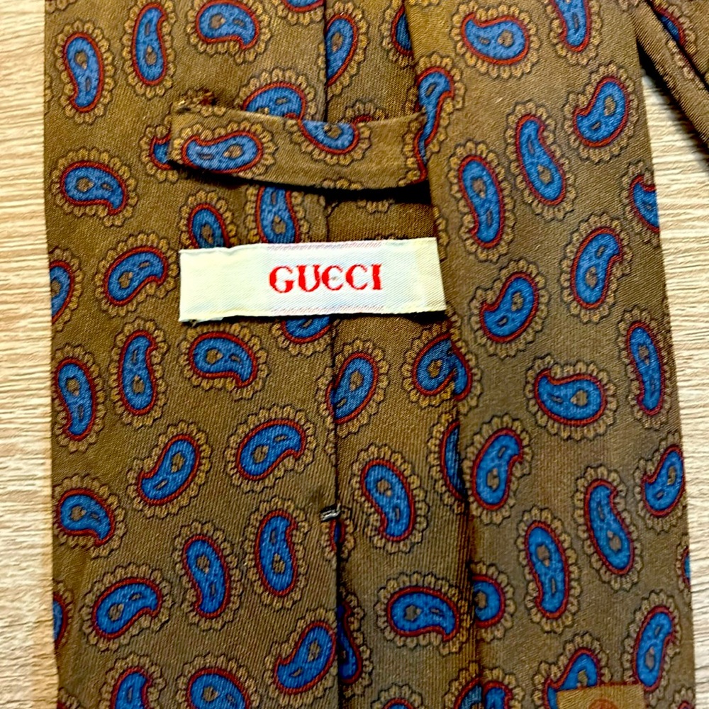 Authentic Gucci Tie-Brown/ with blue paisley.